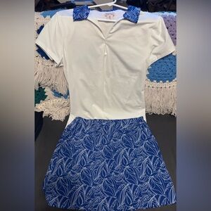 Tommy Bahama shirt and skort set, wicking material, size M. Racquet and paddle.